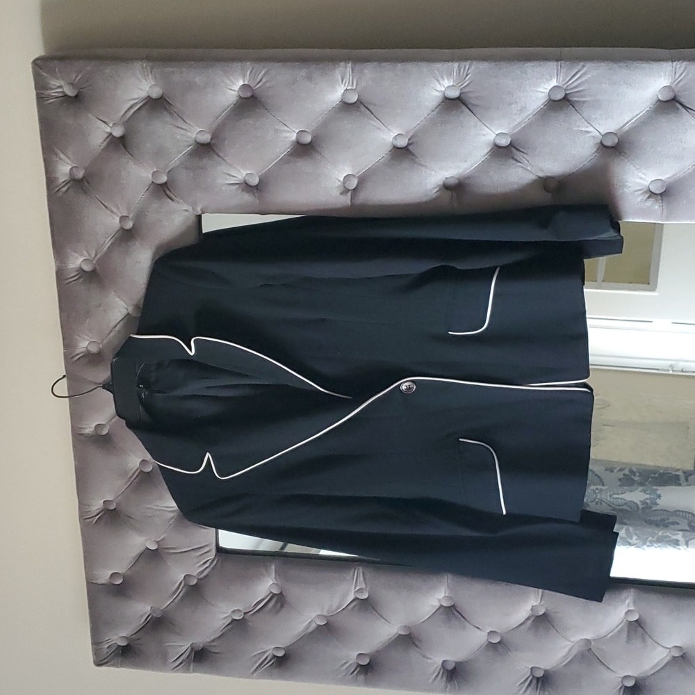 La Chateau medium size blazer. Black with white accents.